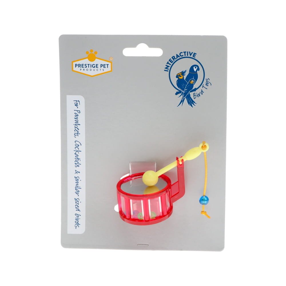 Bird toy drum packaging with a red and yellow bird toy on a gray background