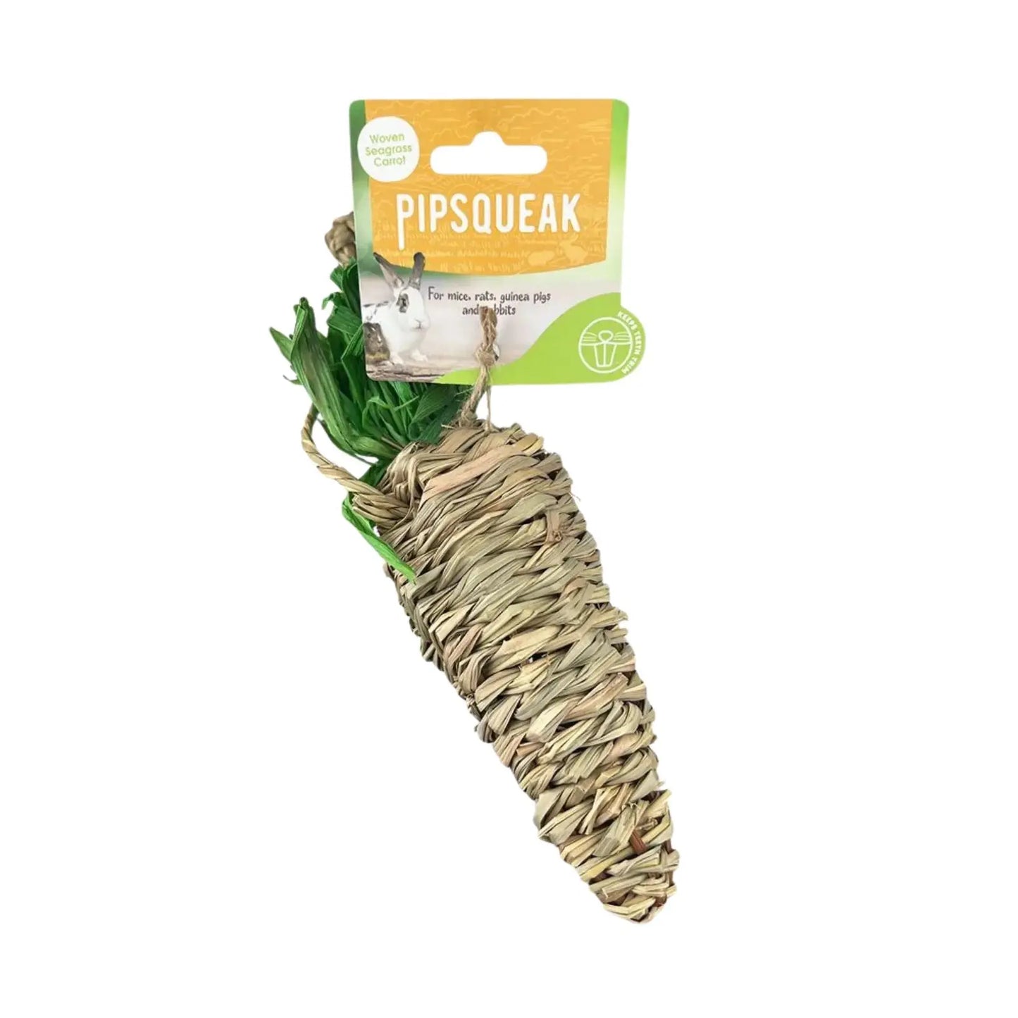 Pipsqueak natural grass carrot pet toy with green leafy top and a cardboard hanger, shown on a plain white background.