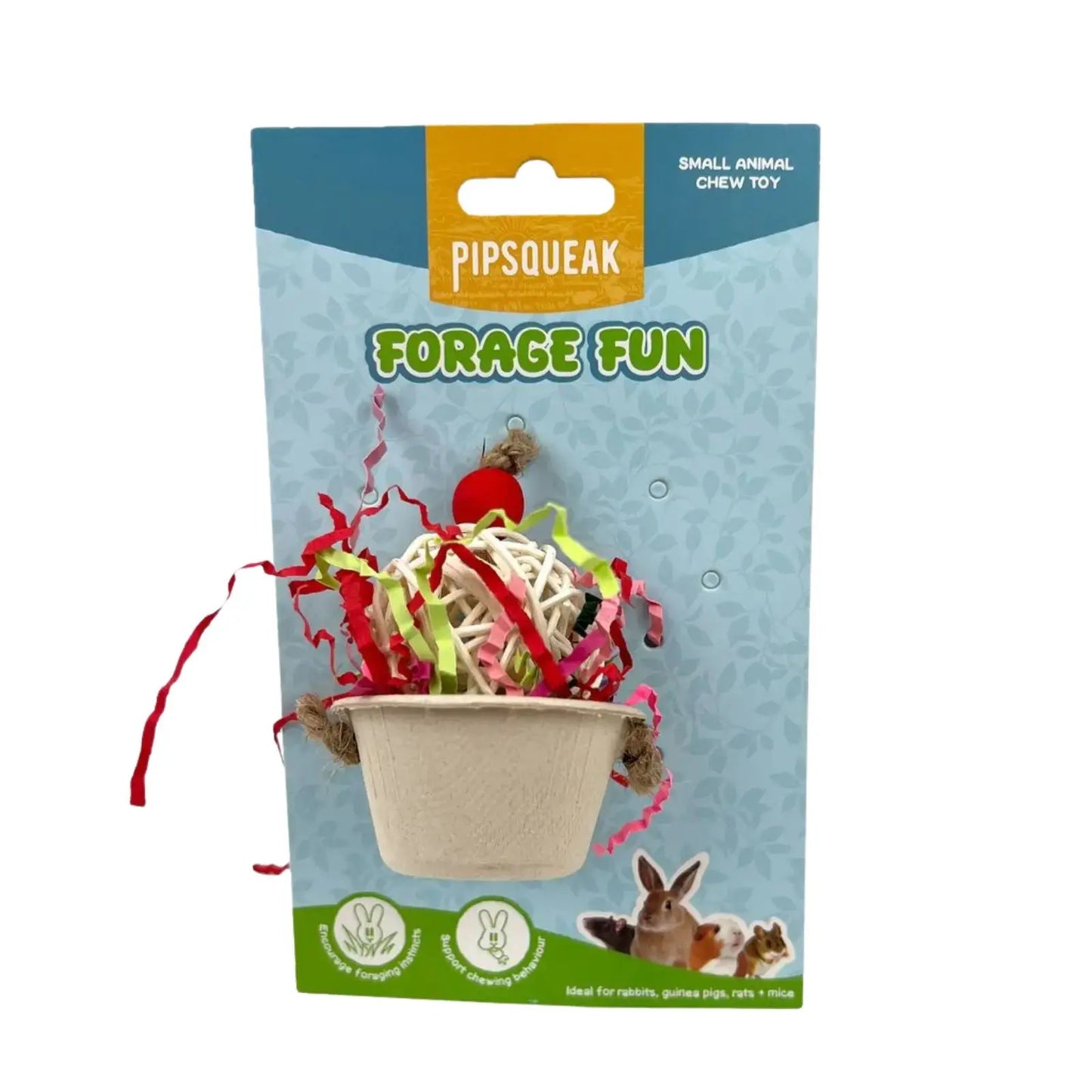 Pipsqueak Forage Fun rabbit chew toy in its original packaging. The toy consists of a small beige paper cup filled with shredded paper forage in red, green, and white, with a red hanging loop.