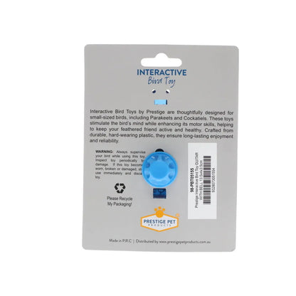 A blue plastic interactive bird toy attached to a gray retail backing card. The card includes product text, a barcode, and the Prestige Pet Australia logo at the bottom.