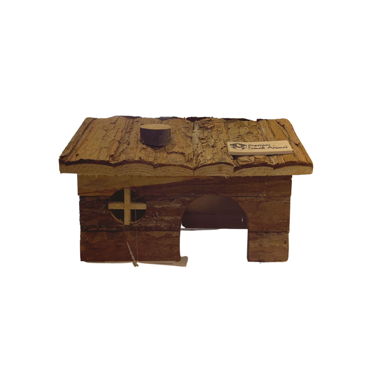 A small rustic wooden house or shelter for small animals with a slanted roof, front arch opening, and a cross cutout on the side, shown on a plain white background. A small tag is attached to the roof.