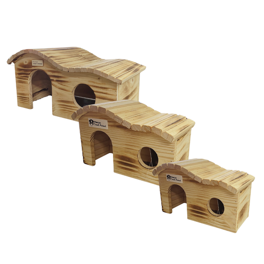 Three small wooden house-shaped climbing steps or pet perches made of natural pine wood, arranged diagonally on a plain white background. Each house has a curved roof, an arched entry opening, and a circular cutout.